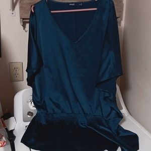 This is a tunic type of blouse that could be worn over a pair of leggings